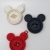 3D printed round ear cruise bag charms in white black and red