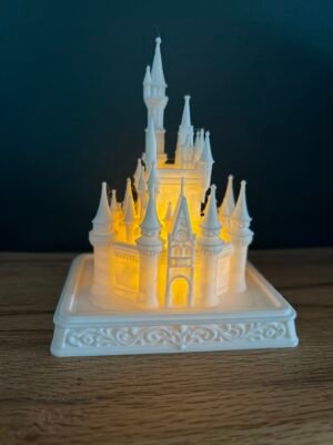 img 9538 Light up Cinderella Castle on an ornate scrolled plinth – white 3D printed Walt Disney World Magic Kingdom castle glowing with a warm LED tea light